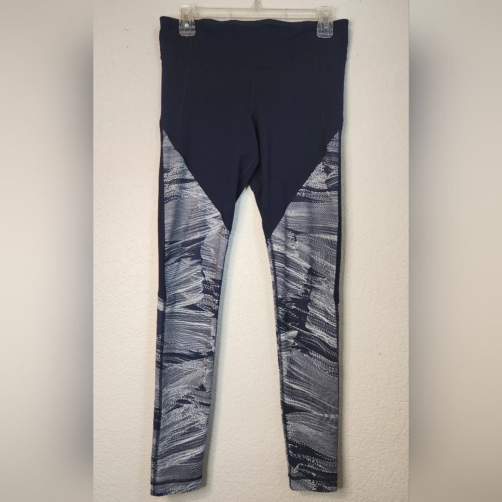Under Armour Women's Navy Leggings with Navy/ White Abstract Designs on the Legs